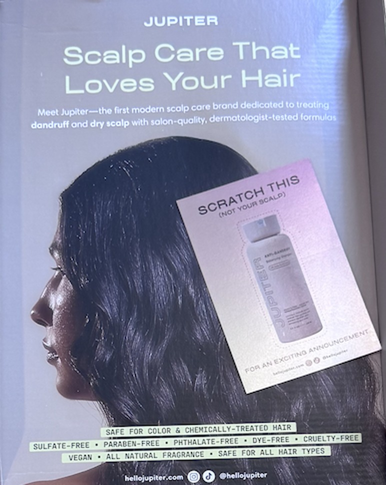 Inside of a Jupiter mailer box reading Scalp Care That Loves Your Hair, with a promotional insert card reading Scratch This, Not Your Scalp